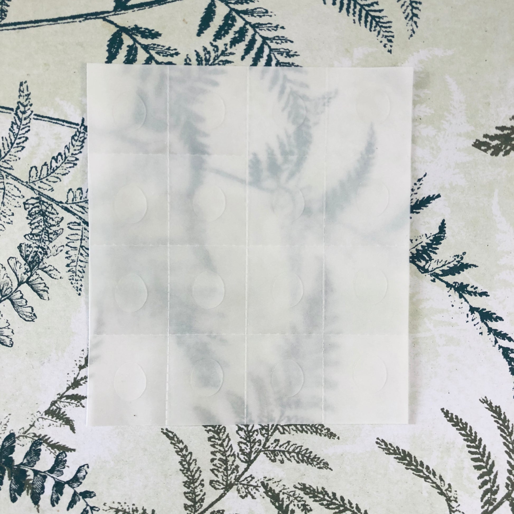 16 adhesive sticky dots on 1 sheet. Perfect for sticking down our scented and unscented drawer liners.